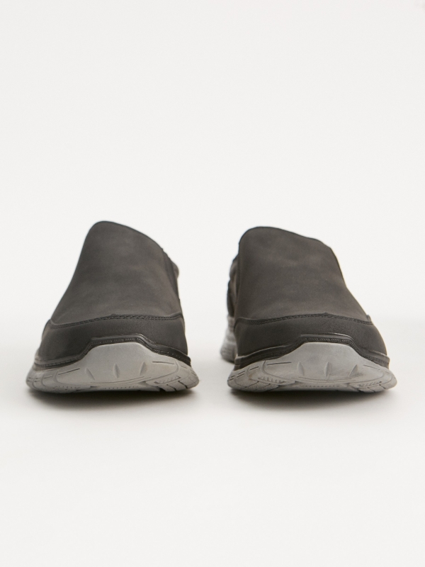 Zapato aplicaciones elásticas negro vista detalle