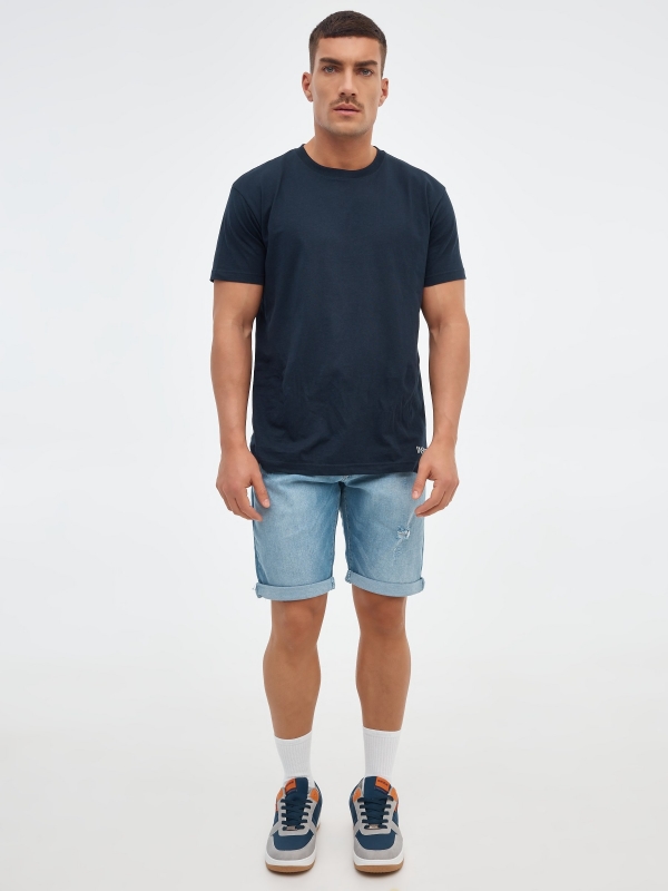 Ripped washed effect denim bermuda short blue front view