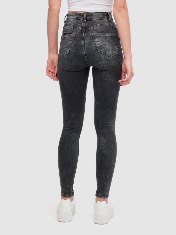 Skinny jeans push up black middle back view