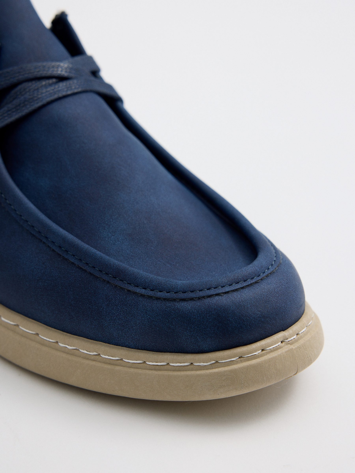 Navy blue wallabee shoe navy detail view