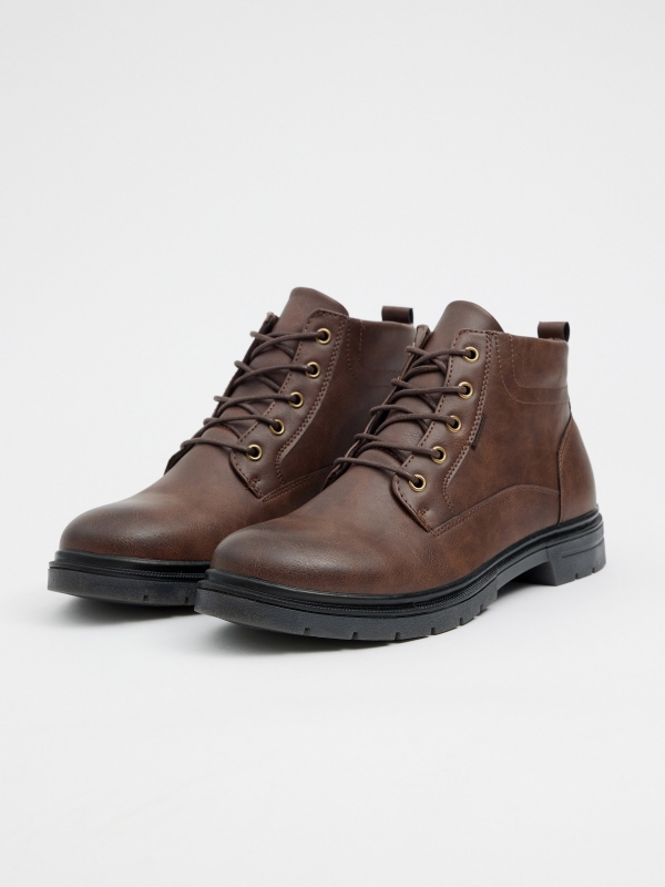 Brown faux leather boot with laces chocolate 45º front view
