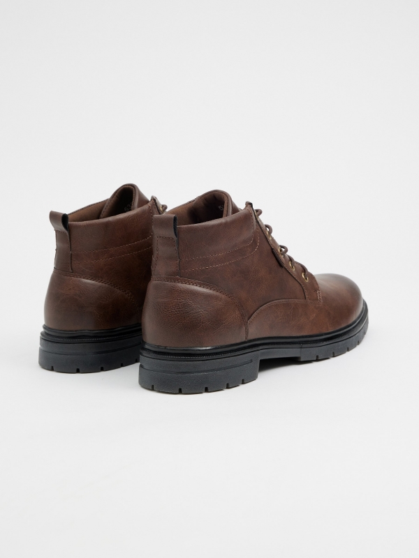 Brown faux leather boot with laces chocolate 45º back view