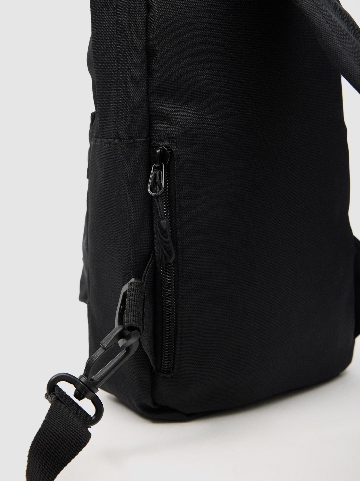 Crossed backpack detail view