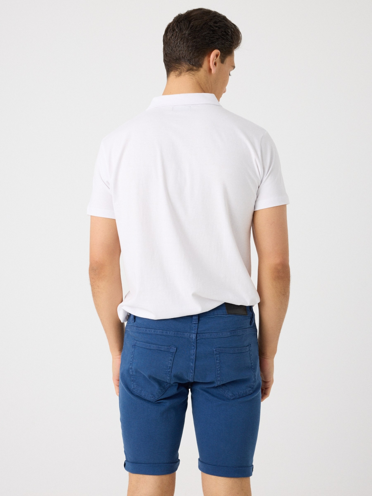 Coloured denim shorts indigo middle back view