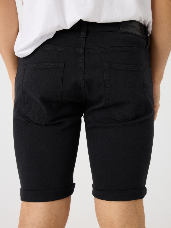 Coloured denim shorts black detail view