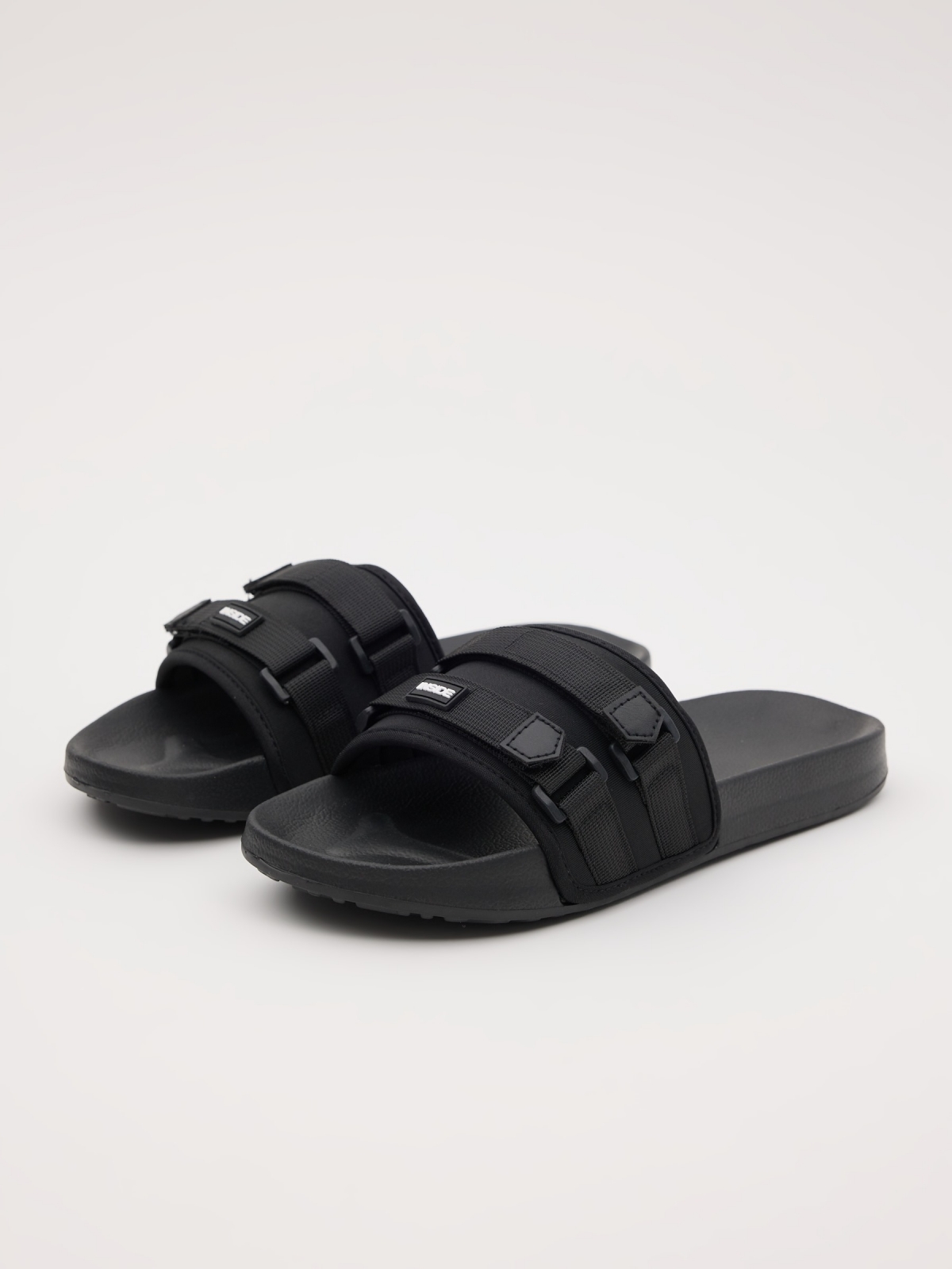 Flip flops with buckle fasteners black 45º front view