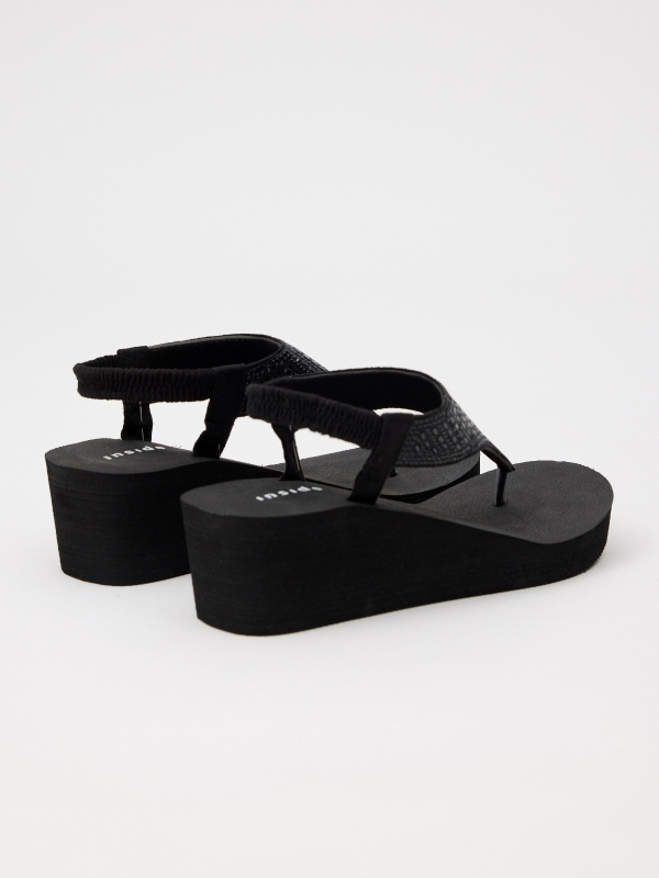 Wedge flip flops with glitter black 45º front view
