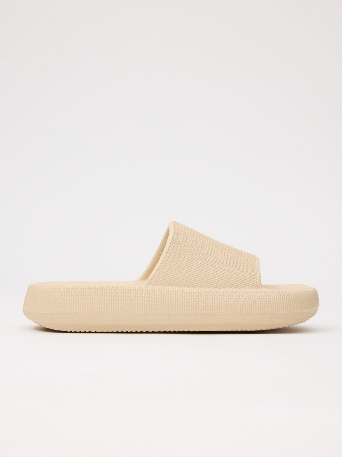 Beach flip flops with platform sand lateral view