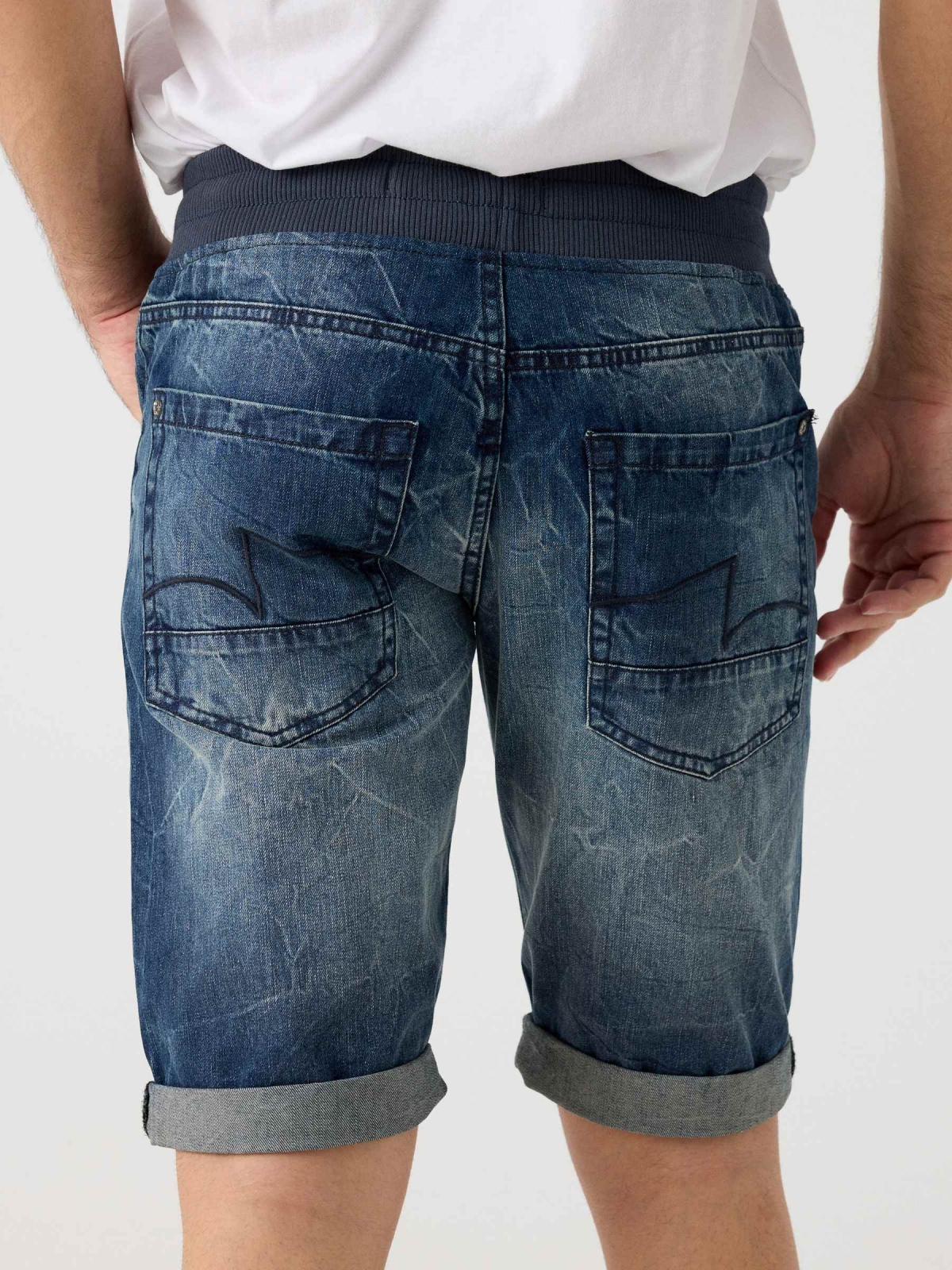 Ripped denim shorts elastic waist blue detail view