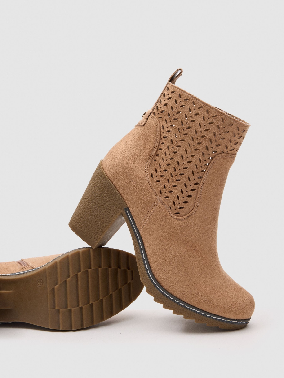 Suede-effect die-cut high-heeled ankle boot sand detail view