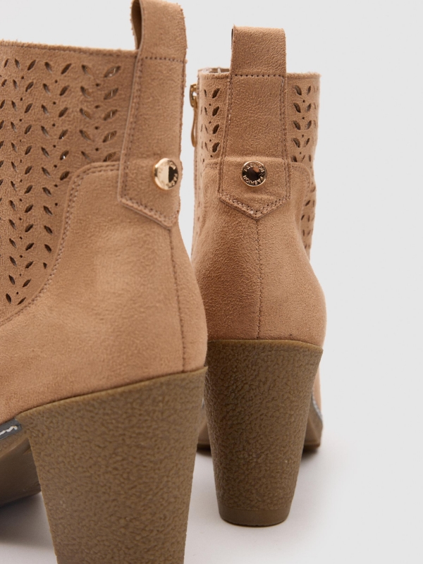 Suede-effect die-cut high-heeled ankle boot sand detail view