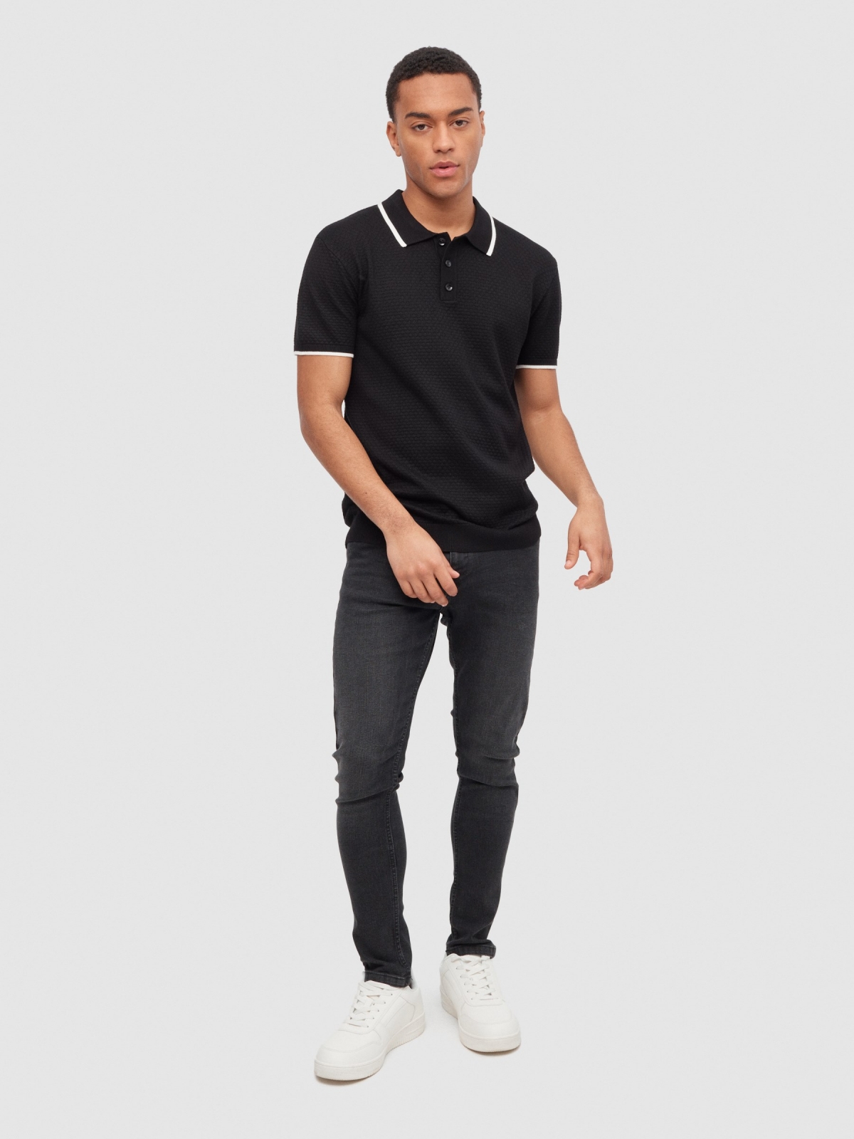Knitted polo shirt black front view