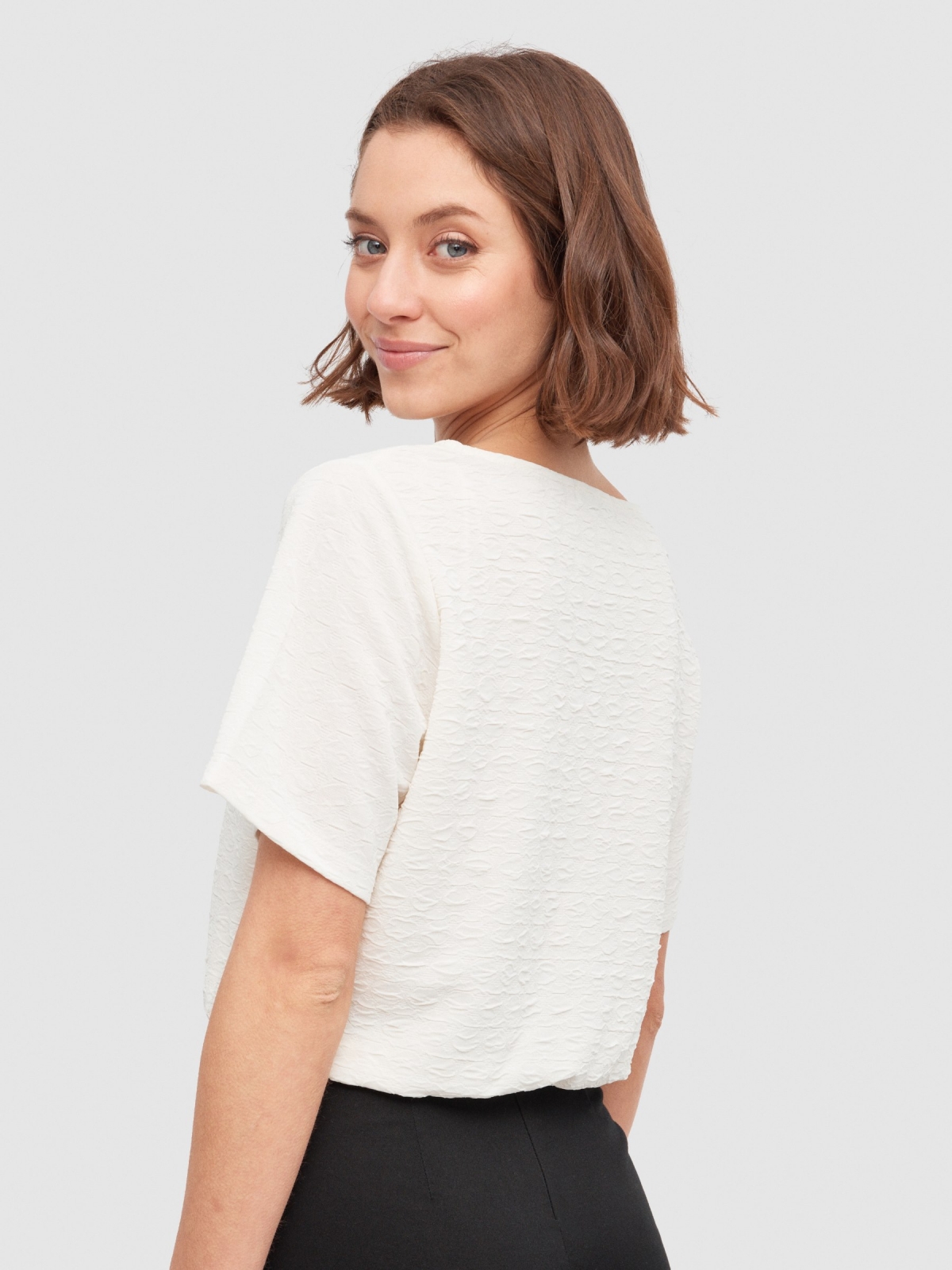 3/4 sleeve T-shirt with buttons off white middle back view