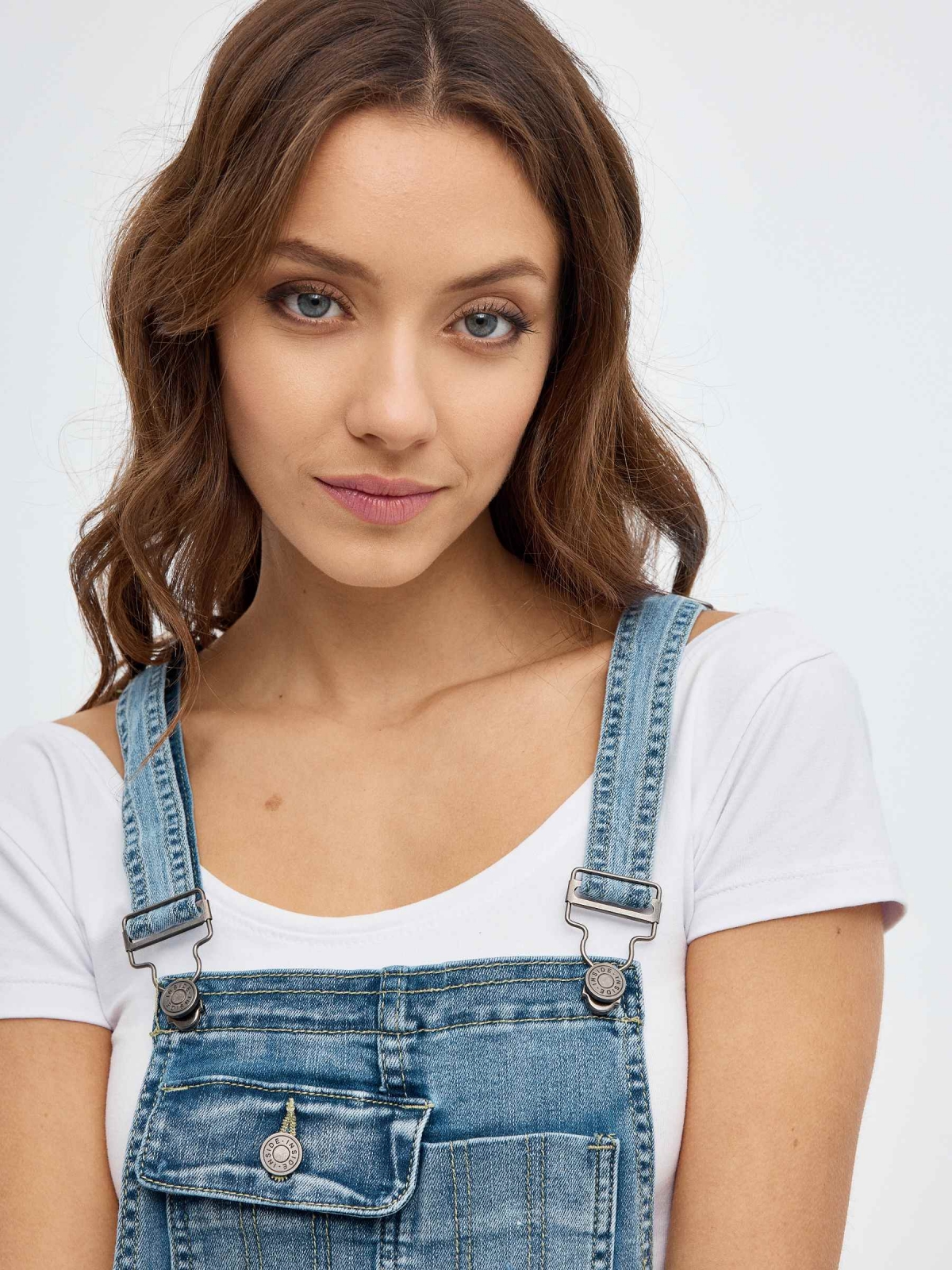 Denim dungarees with lace blue detail view