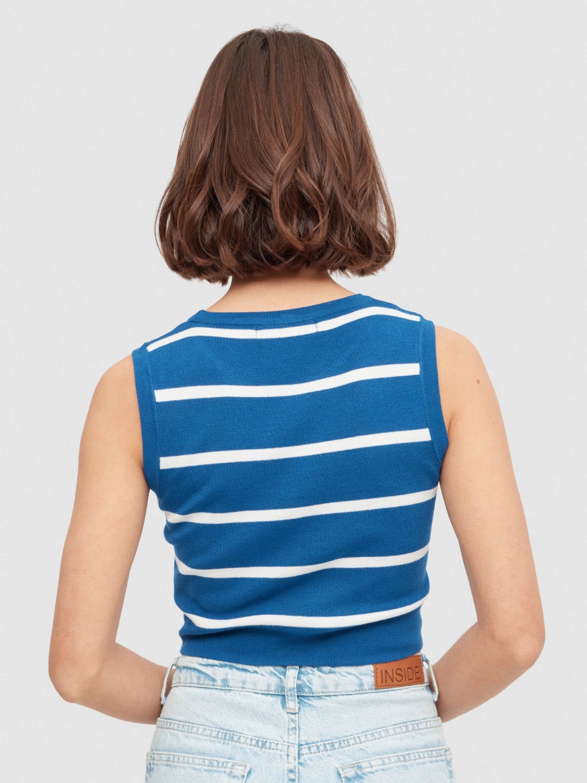 Striped top electric blue middle back view