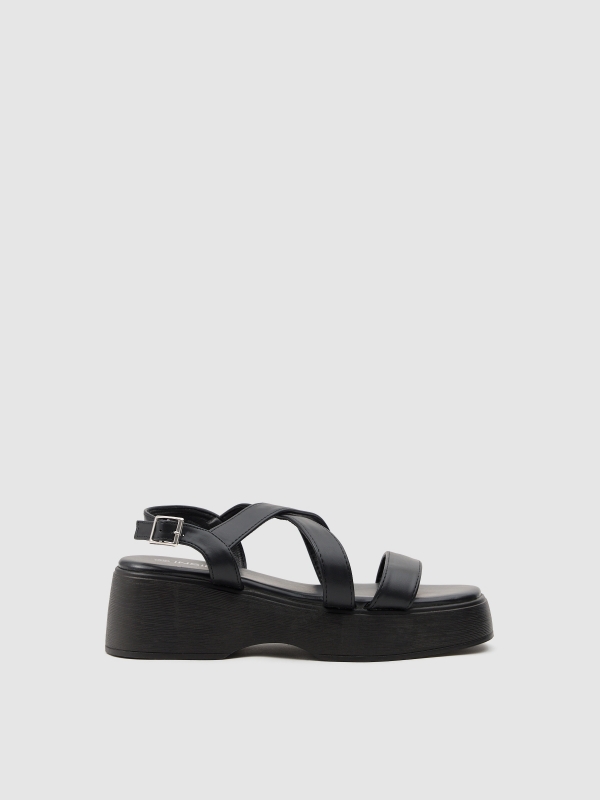 Strappy platform sandal black with a model