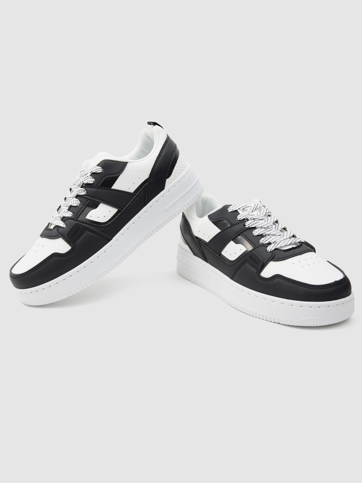 Black and white skater sneakers white detail view