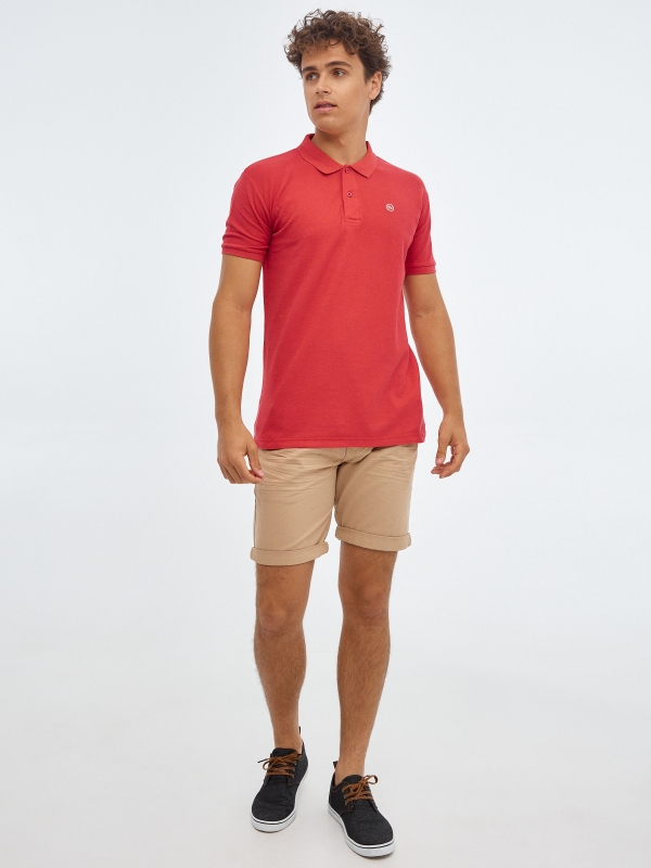 Basic polo shirt with engraved logo red front view