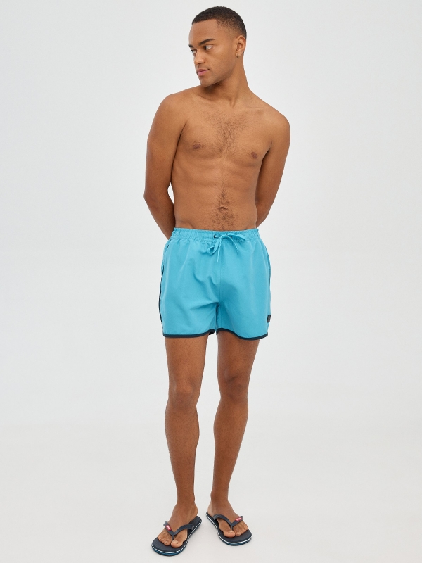 Contrast trim short swimsuit blue front view