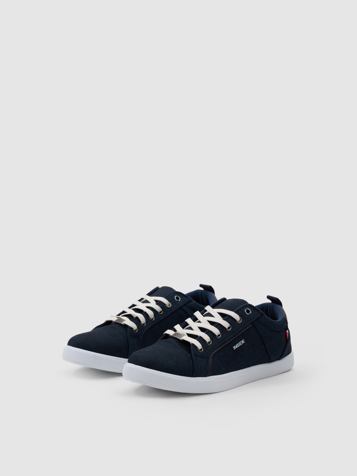 Canvas lace-up sneaker navy 45º front view