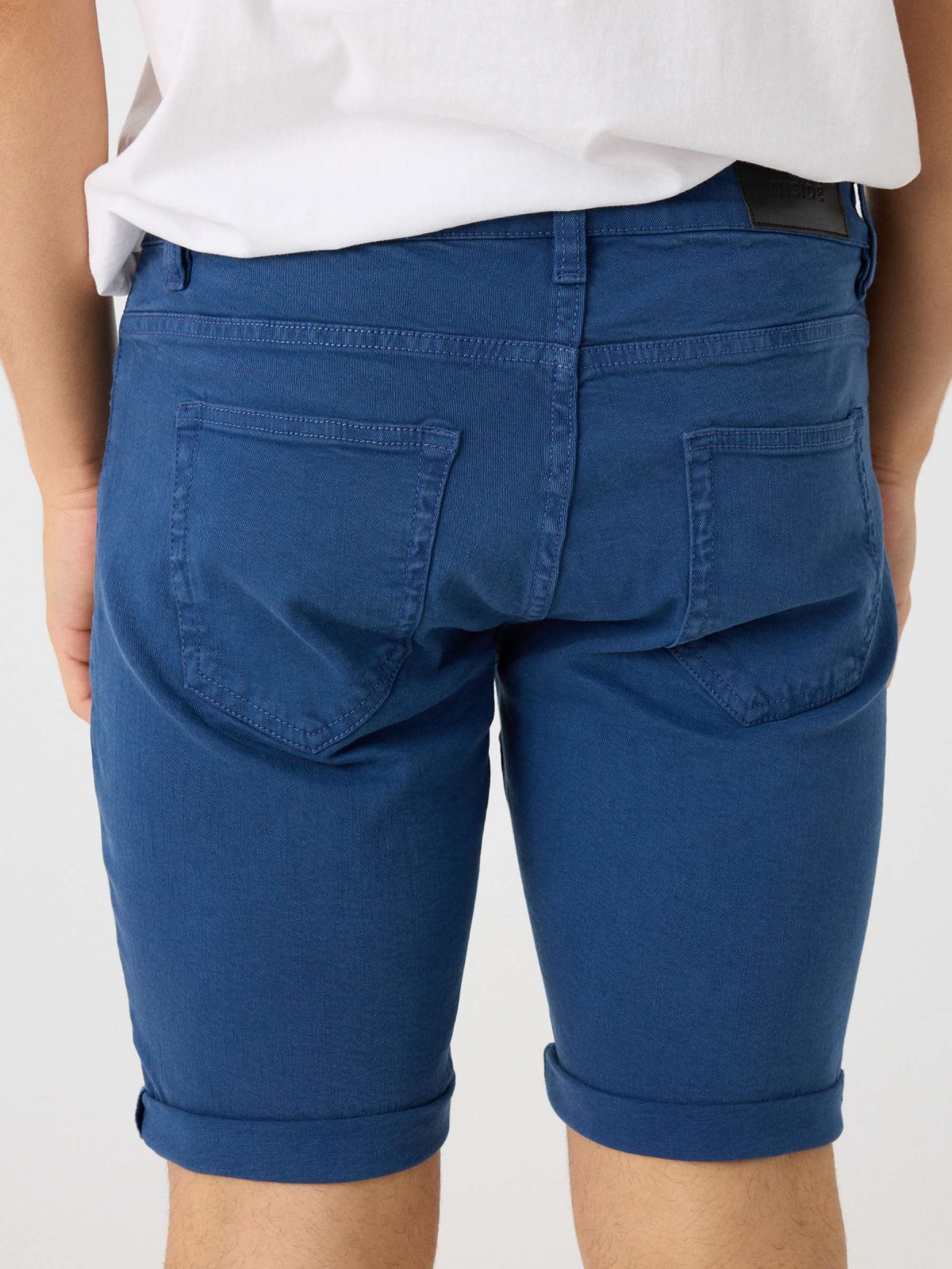 Coloured denim shorts indigo detail view