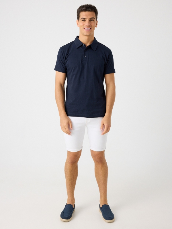 Coloured denim shorts white front view