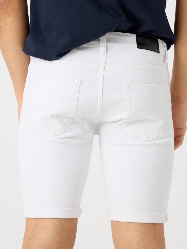 Coloured denim shorts white detail view