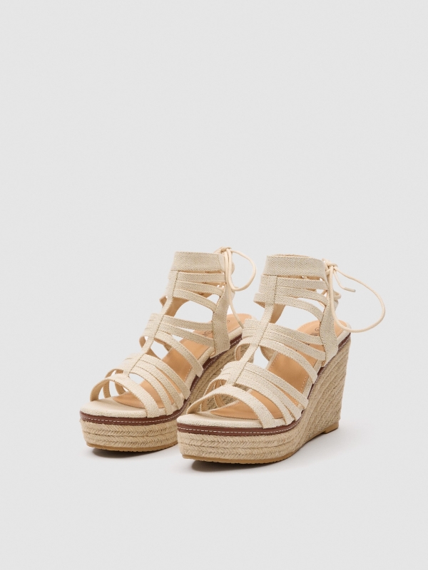 Wedge Roman straps off white 45º front view