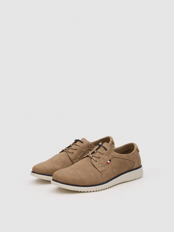 Classic sports shoe light brown 45º front view