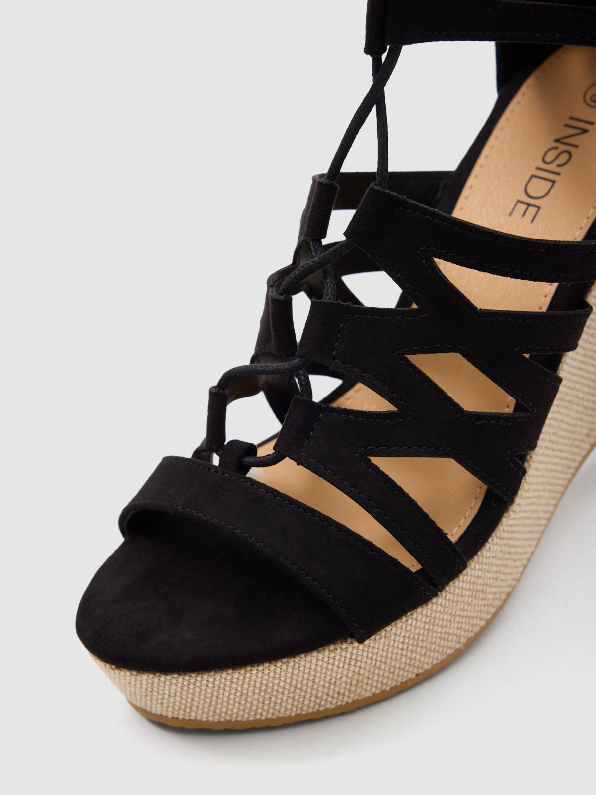 Wedge sandal with laces black detail view
