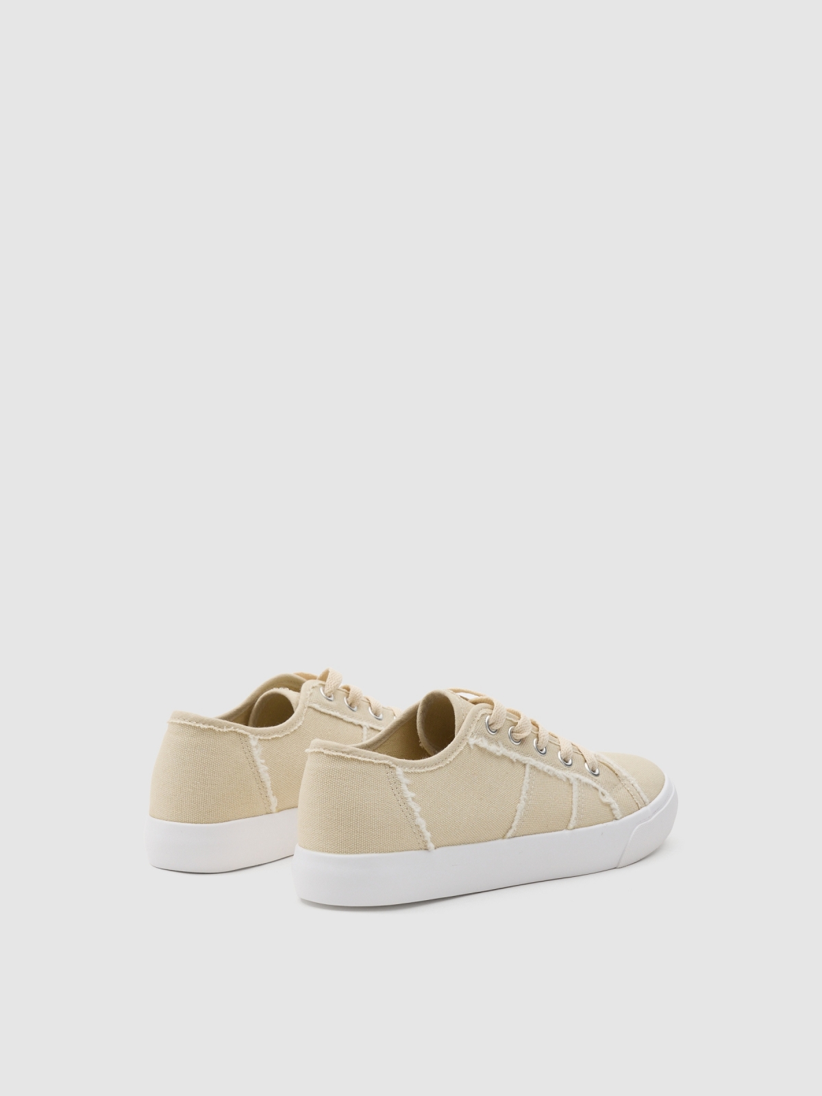 Canvas sneaker untucked sand 45º back view
