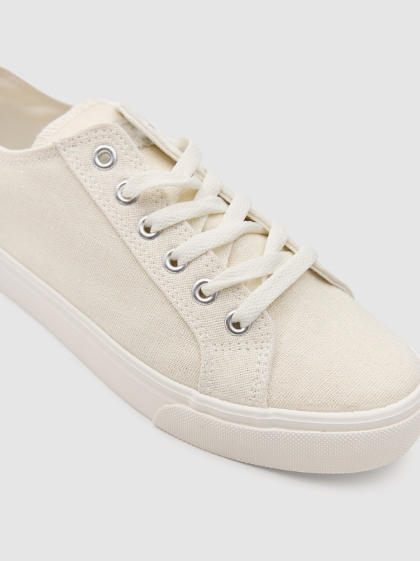 Shiny canvas sneaker off white detail view