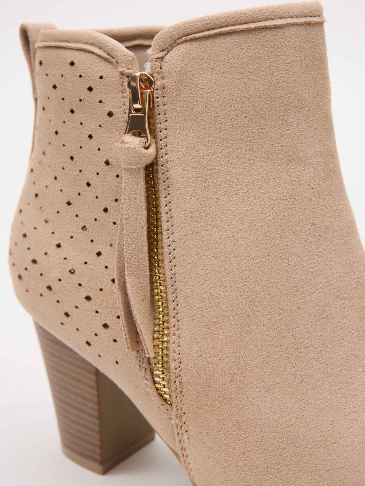 Low-heel die-cut leather-effect ankle boot sand detail view