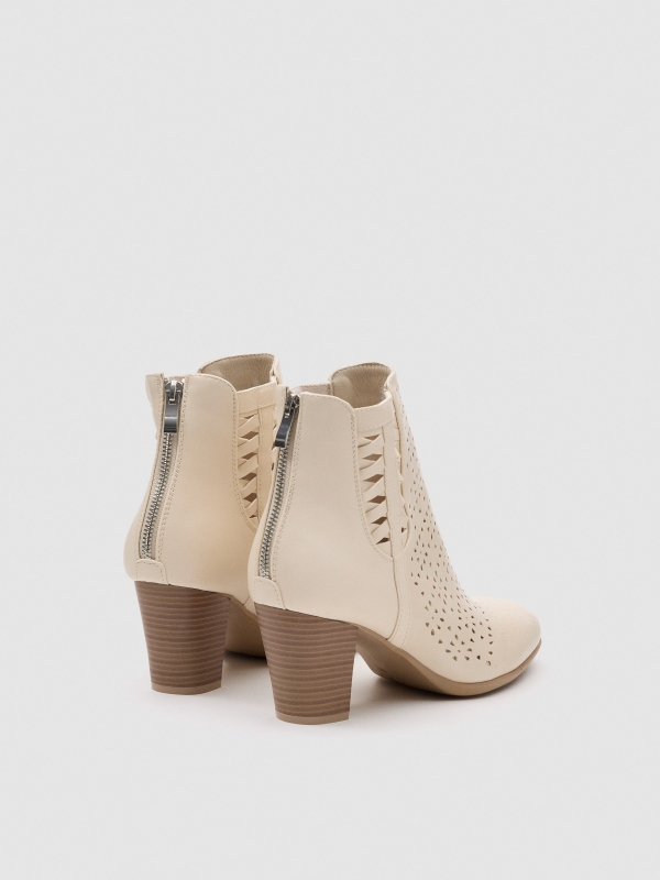 Side-braid cream leather-effect ankle boot sand 45º back view
