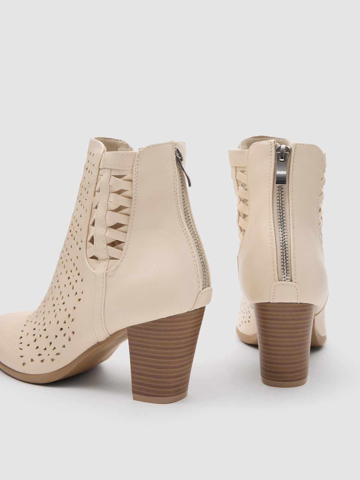 Side-braid cream leather-effect ankle boot sand detail view