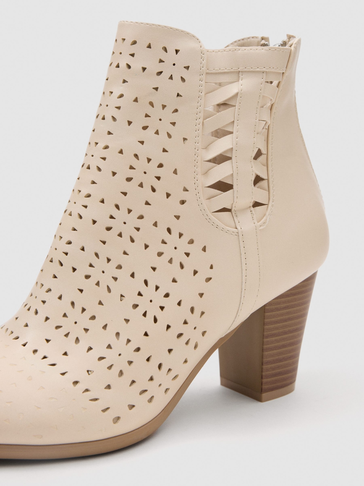 Side-braid cream leather-effect ankle boot sand detail view
