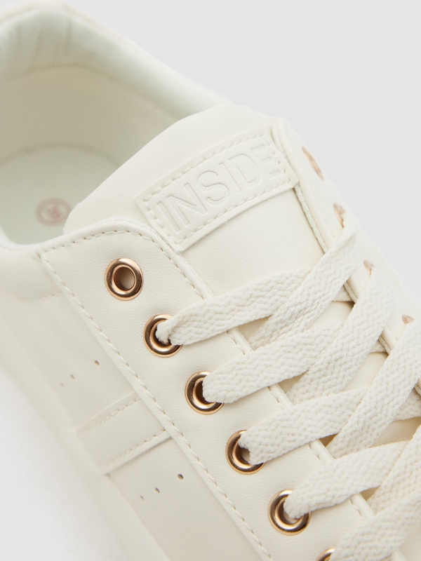 Basic cream sneaker detail view