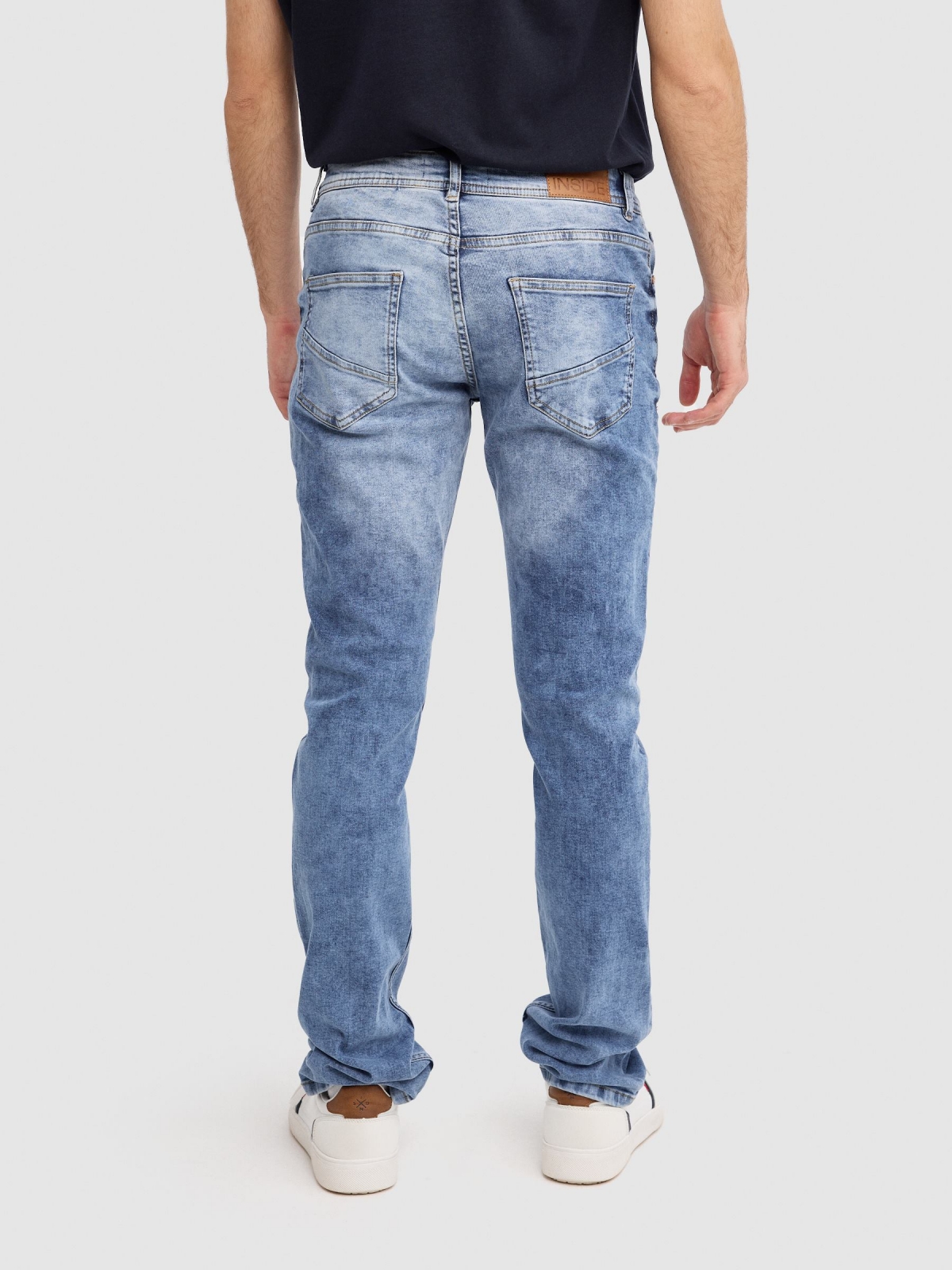 Regular wash jeans blue middle back view