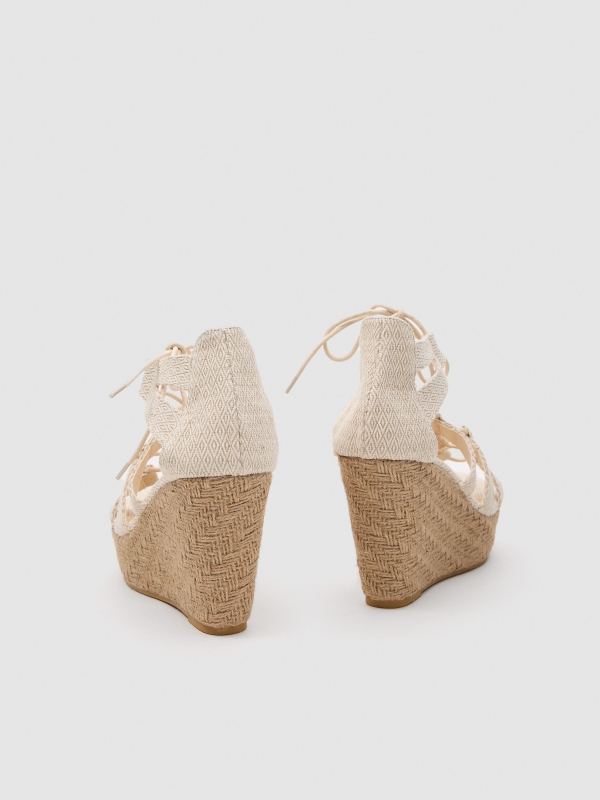 Wedge sandal with straps off white detail view