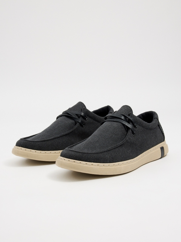 Laced wallabee shoe 45º front view