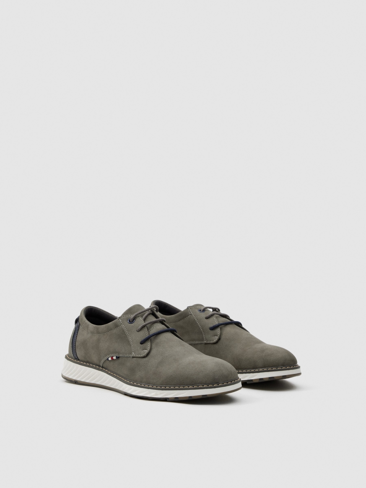 Sports shoe with laces medium grey 45º back view