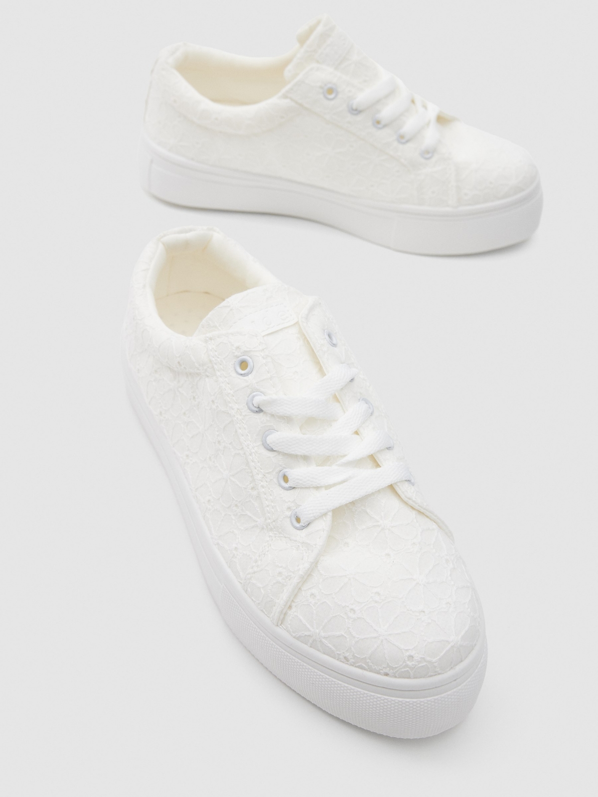 Embroidered white sneaker white detail view