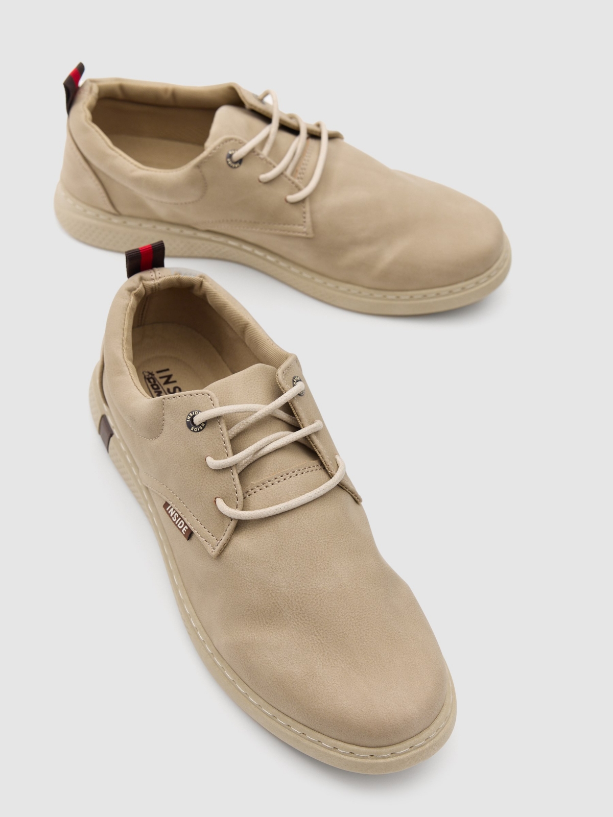 Casual lace-up sneakers sand detail view