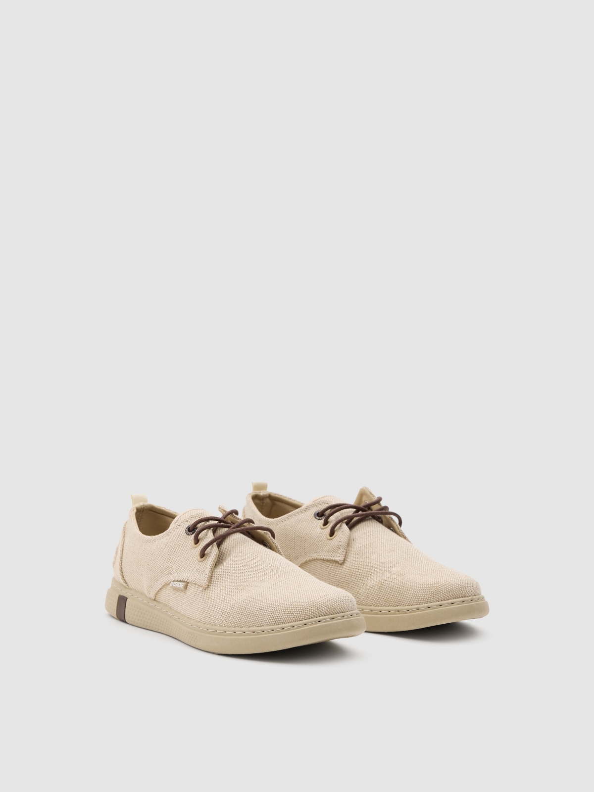 Canvas lace-up sneakers sand 45º front view