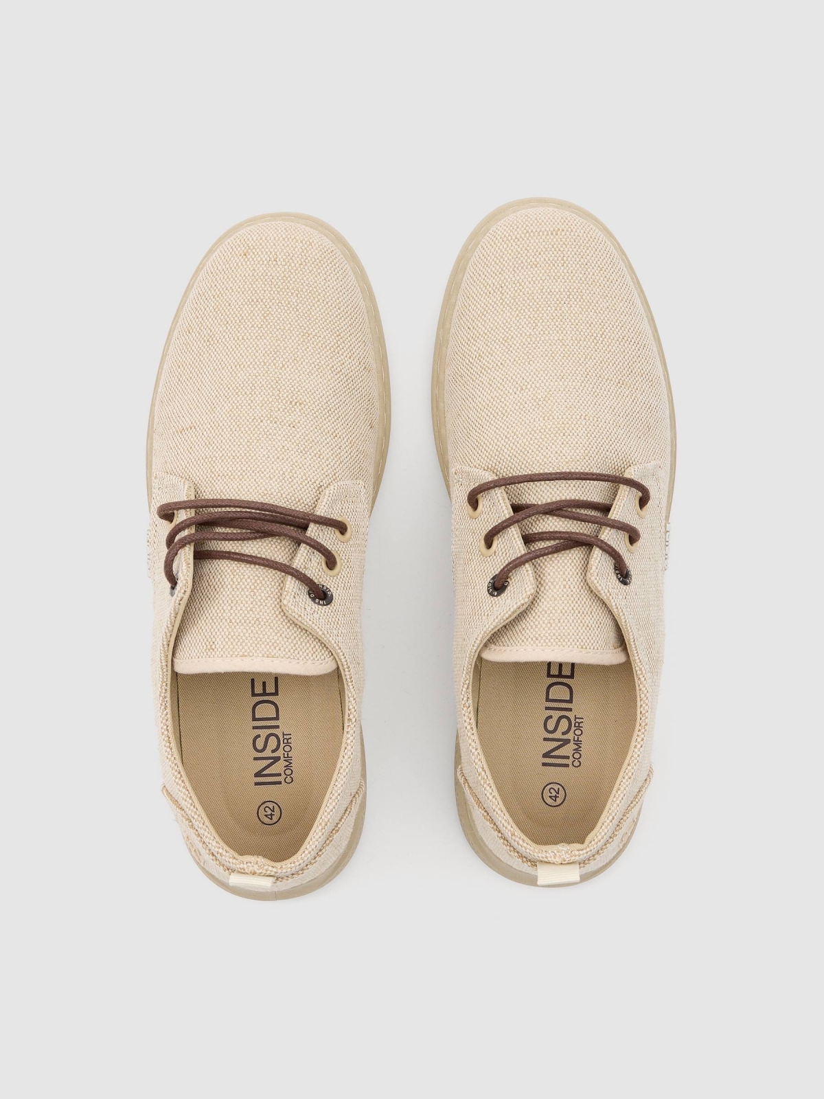 Canvas lace-up sneakers sand zenithal view
