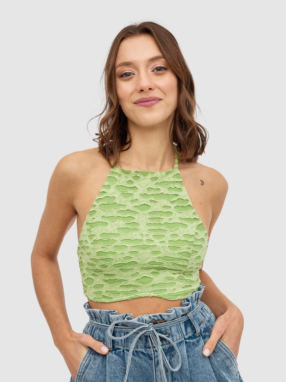 Halter top with knotted back light green middle front view