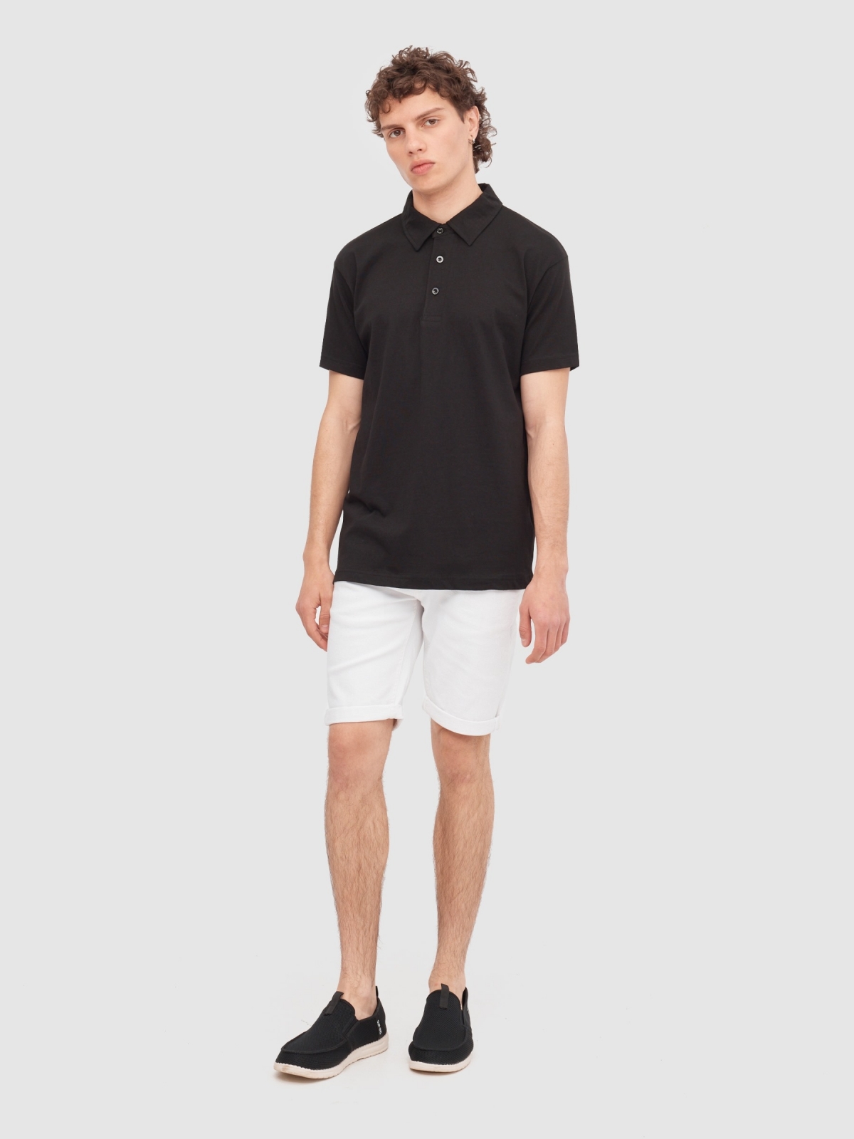 Basic short-sleeved polo shirt black front view