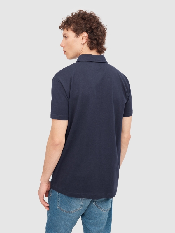 Basic short-sleeved polo shirt navy middle back view