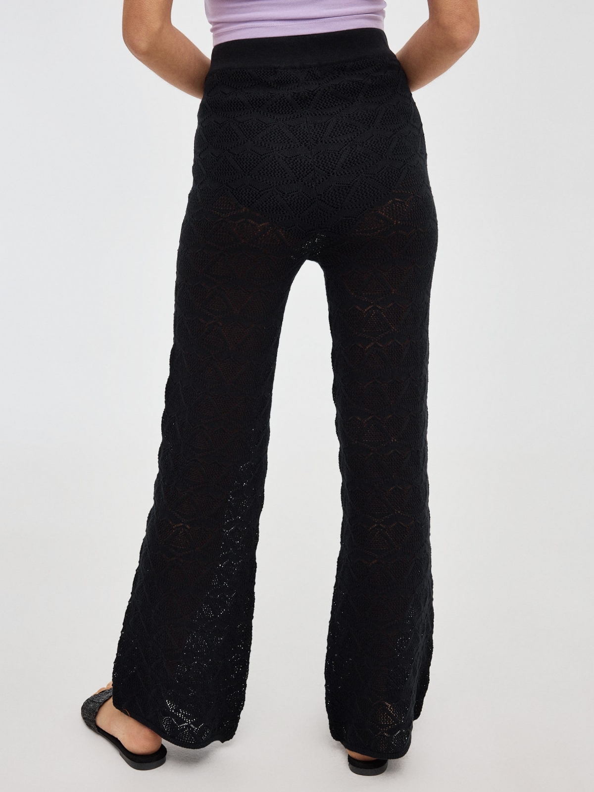 Crochet flare pants black middle back view
