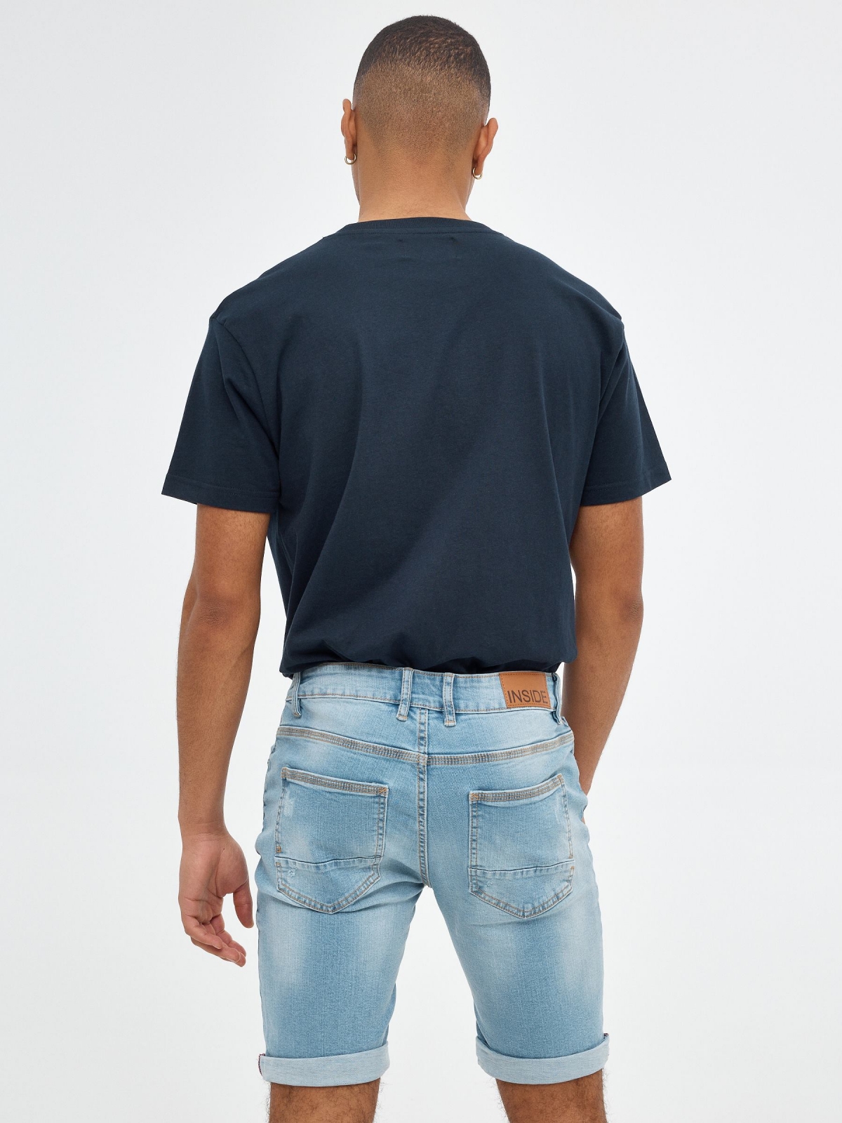 Skinny washed Bermuda blue middle back view